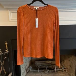NWT - long sleeved, burnt orange knit top size small.